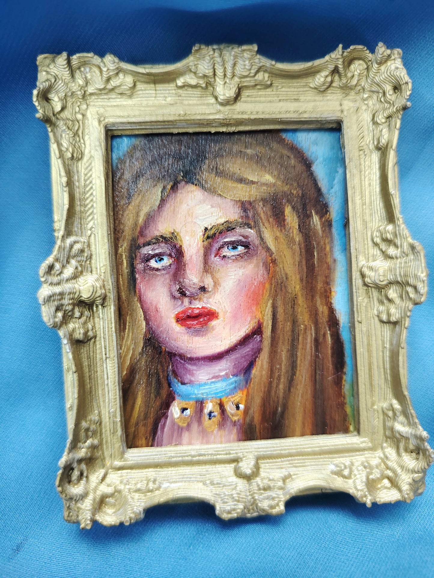 Huile sur bois miniature "La grincheuse"